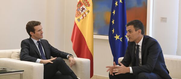 El presidente del Partido Popular, Pablo Casado, y, el presidente del Gobierno español, Pedro Sánchez (archivo) - Sputnik Mundo