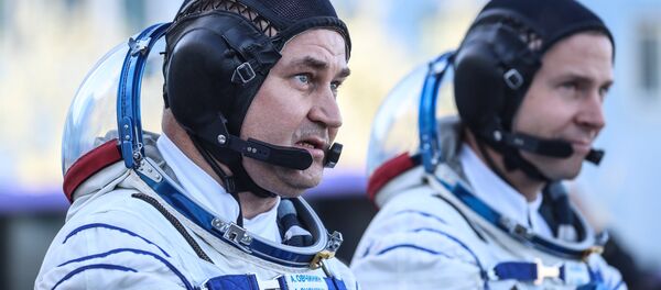 El ruso Alexéi Ovchinin y el estadounidense Nick Hague - Sputnik Mundo