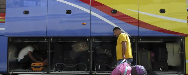 Un migrante venezolano en Santo Domingo, la República Dominicana - Sputnik Mundo