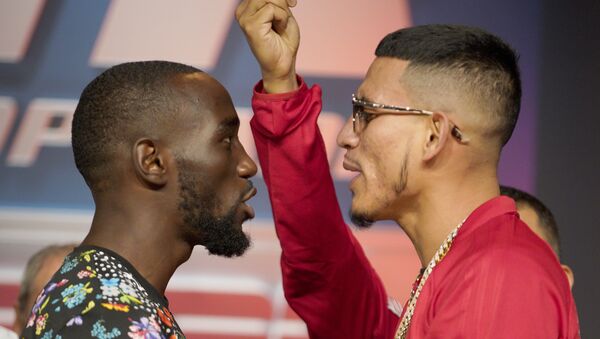 El boxeador Terence Crawford  y su contrincante José Benavidez Jr. - Sputnik Mundo