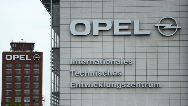 El logo de la marca de autos Opel - Sputnik Mundo