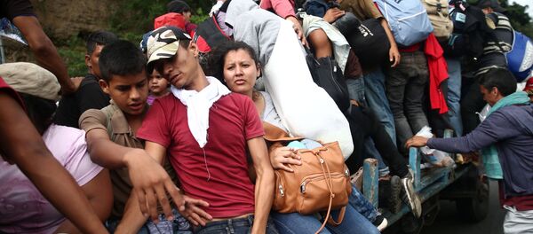 Migrantes hondureños Migrantes hondureños - Sputnik Mundo