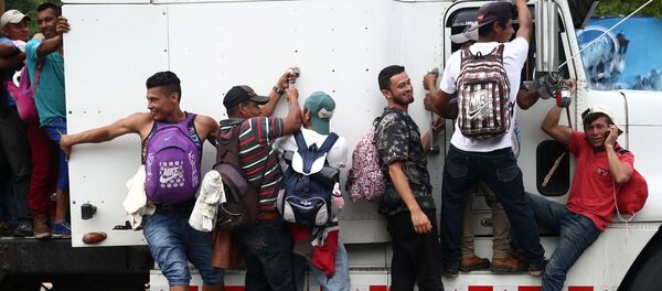 Migrantes hondureños Migrantes hondureños - Sputnik Mundo