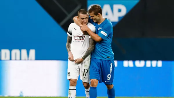 Futbolistas rusos Pável Mamáev y Alexandr Kokorin - Sputnik Mundo