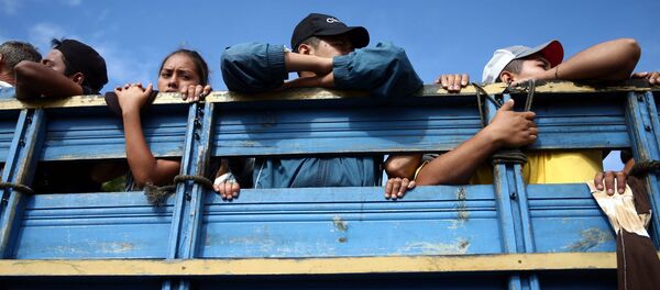 Migrantes hondureños - Sputnik Mundo