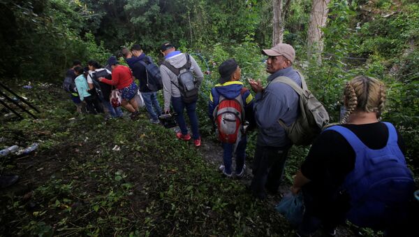 Migrantes hondureños - Sputnik Mundo