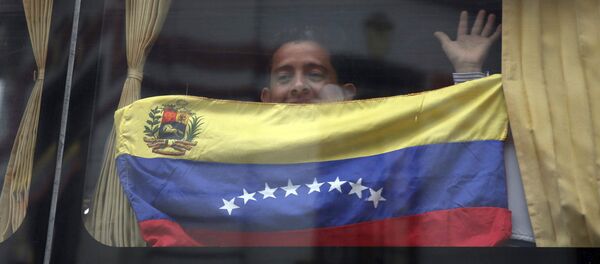 Un migrante venezolano - Sputnik Mundo