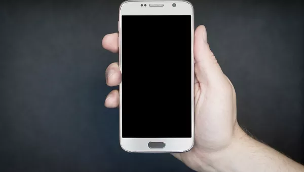 Un smartphone - Sputnik Mundo