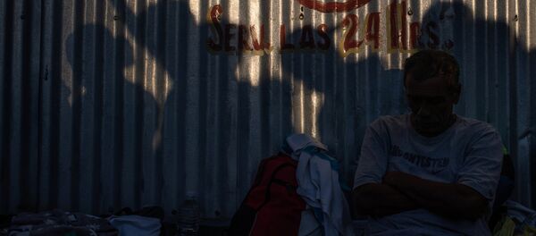 Las siluetas de unos migrantes en México Las siluetas de unos migrantes en México - Sputnik Mundo