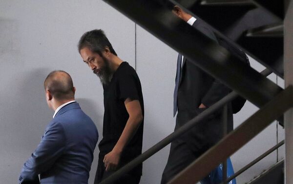 Jumpei Yasuda, periodista japonés liberado recientemente de manos de los radicales sirios, regresando a Japón - Sputnik Mundo