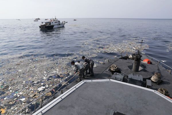Accidente del Boeing indonesio: esto es lo que hallaron los rescatistas en el lugar de la tragedia - Sputnik Mundo