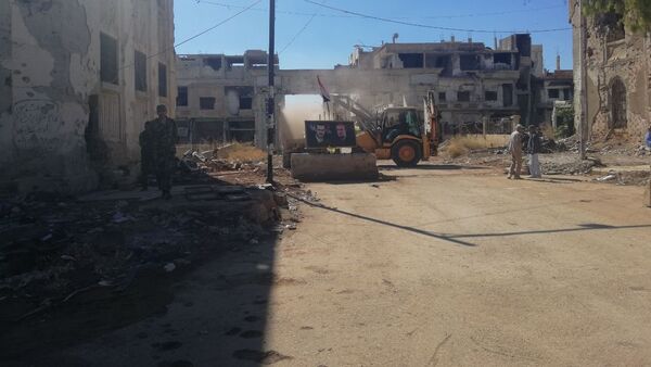 Edificios destruidos en Deraa Edificios destruidos en Deraa - Sputnik Mundo