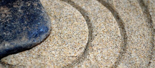 Una piedra, imagen referencial Una piedra, imagen referencial - Sputnik Mundo