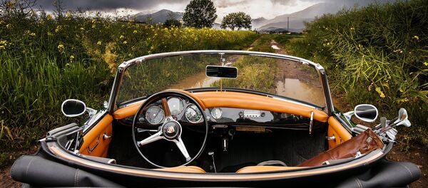 Un auto (imagen referencial) Un auto (imagen referencial) - Sputnik Mundo