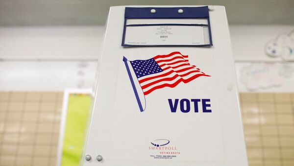 Una cabina de votación en EEUU - Sputnik Mundo