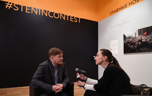 Se inaugura en Moscú la exposición del IV Fotoconcurso Internacional Andréi Stenin - Sputnik Mundo