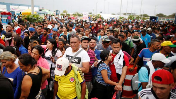 Los migrantes venezolanos - Sputnik Mundo