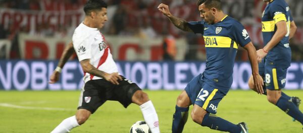 Enfrentamiento entre Boca Juniors y River Plate durante la final de la Supercopa Argentina en Mendoza, el 14 de mayo de 2018 - Sputnik Mundo
