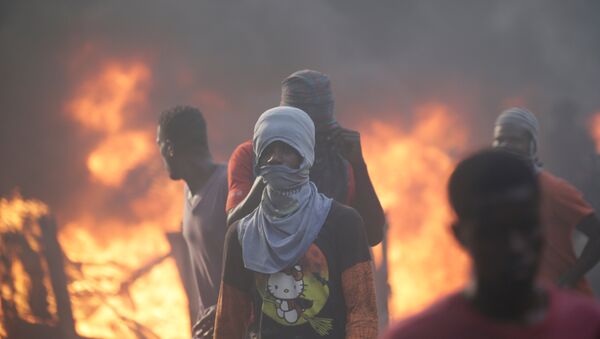 Protestas en Haití - Sputnik Mundo