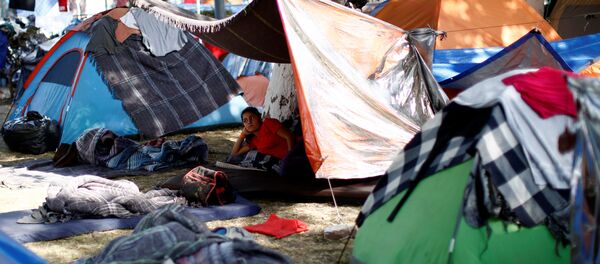 Migrantes latinoamericanos en México - Sputnik Mundo