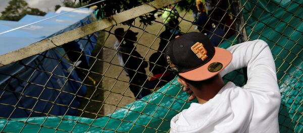 Un migrante venezolano en Colombia - Sputnik Mundo