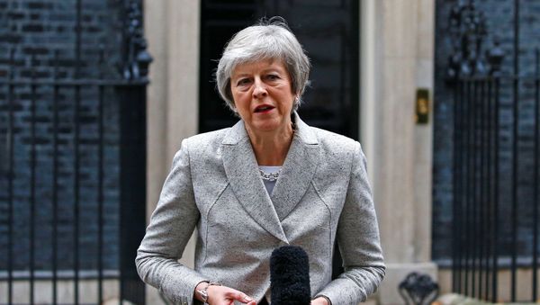 Britain's Prime Minister Theresa May addresses the media outside 10 Downing Street in London, Britain, November 22, 2018. Britain's Prime Minister Theresa May addresses the media outside 10 Downing Street in London, Britain, November 22, 2018. - Sputnik Mundo