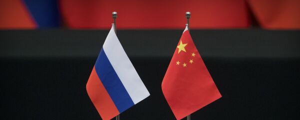 Las banderas de Rusia y China - Sputnik Mundo