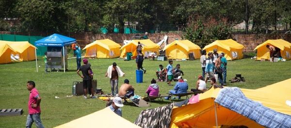 Cerca de 300 inmigrantes venezolanos permanecen desde hace dos semanas en un albergue humanitario en el occidente de Bogotá luego de que fueron trasladados desde las calles a ese lugar - Sputnik Mundo