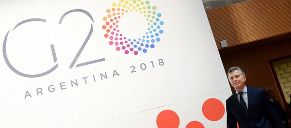 Mauricio Macri junto a un cartel del G20 Mauricio Macri junto a un cartel del G20 - Sputnik Mundo