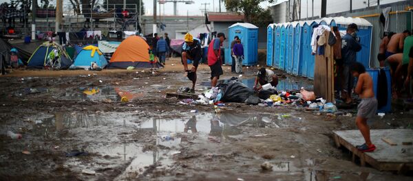 Migrantes centroamericanos en Tijuana Migrantes centroamericanos en Tijuana - Sputnik Mundo