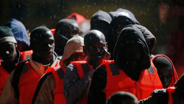 Los migrantes en España Los migrantes en España - Sputnik Mundo