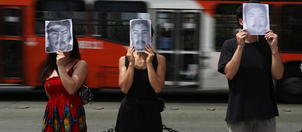 Los chilenos con el retrato del comunero mapuche Camilo Catrillanca Los chilenos con el retrato del comunero mapuche Camilo Catrillanca - Sputnik Mundo