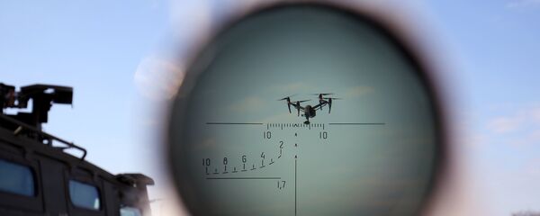 Un dron - Sputnik Mundo