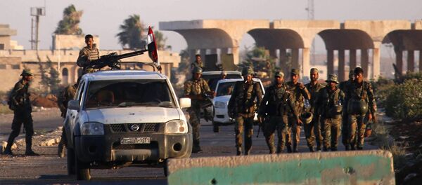 Militares sirios en el paso de Nasib, foto de archivo Militares sirios en el paso de Nasib, foto de archivo - Sputnik Mundo