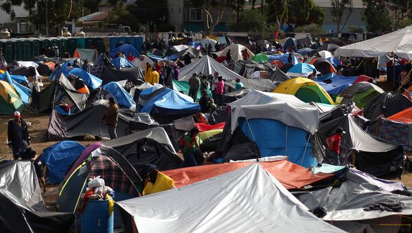 Migrantes centroamericanos en Tijuana Migrantes centroamericanos en Tijuana - Sputnik Mundo