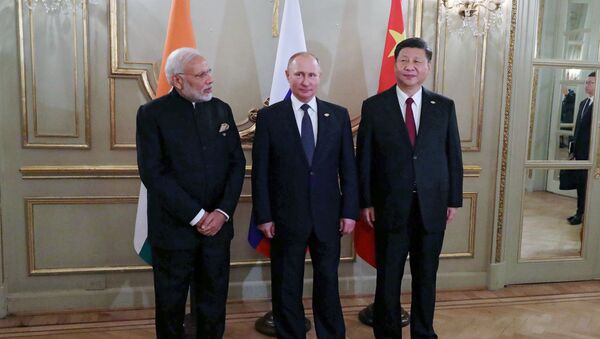 El primer ministro de India, Narenda Modi, presidente de Rusia, Vladímir Putin, y el presidente de China Xi Jinping en G20 en Buenos Aires, Argentina - Sputnik Mundo