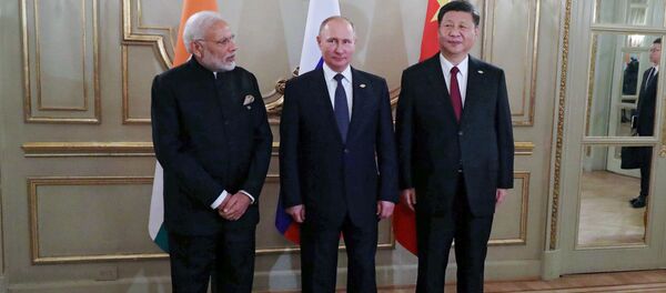 El primer ministro de India, Narenda Modi, presidente de Rusia, Vladímir Putin, y el presidente de China Xi Jinping en G20 en Buenos Aires, Argentina - Sputnik Mundo