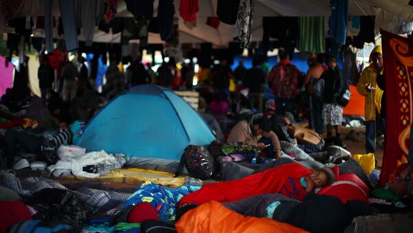 Migrantes centroamericanos en Tijuana - Sputnik Mundo