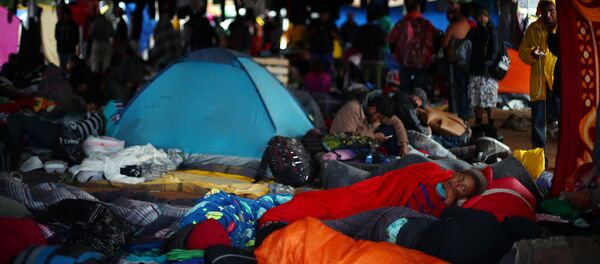 Migrantes centroamericanos en Tijuana - Sputnik Mundo