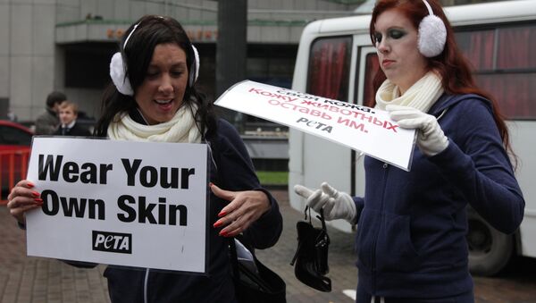 Activistas de PETA - Sputnik Mundo