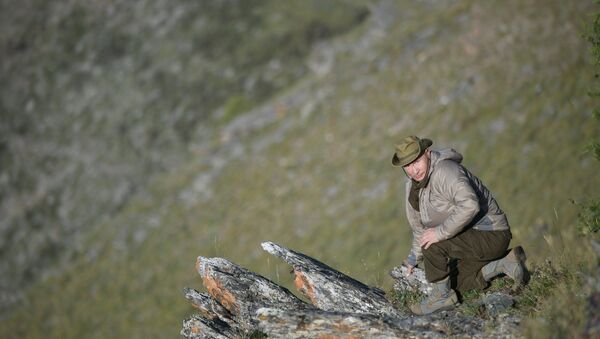 Vladimir Putin, presidente de Rusia, durante sus vacaciones en la región siberiana de Tuva (Rusia), julio de 2018 - Sputnik Mundo