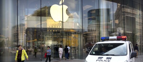 Una tienda de Apple en Pekín Una tienda de Apple en Pekín - Sputnik Mundo
