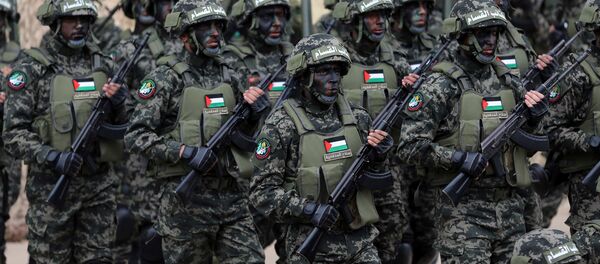 Militantes del movimiento Hamás durante el 31 aniversario de la organización - Sputnik Mundo