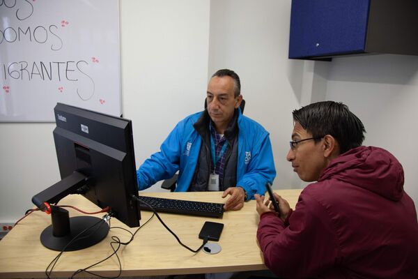 Centro de Atención al Inmigrante que se abrió en Bogotá - Sputnik Mundo