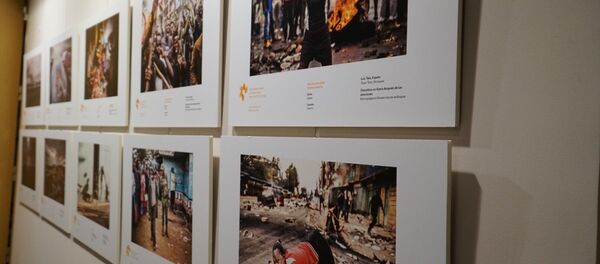 Exposición del concurso Andréi Stenin en Madrid - Sputnik Mundo