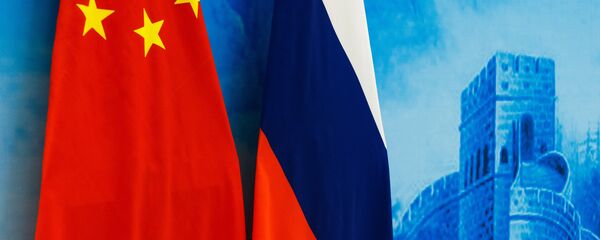 Las banderas de Rusia y China Las banderas de Rusia y China - Sputnik Mundo