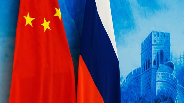 Las banderas de Rusia y China - Sputnik Mundo