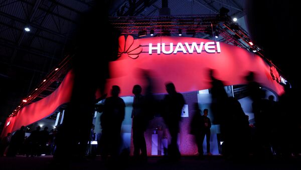 El logo de la compañía china Huawei - Sputnik Mundo