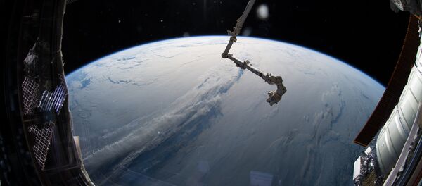 Tierra vista desde la EEI - Sputnik Mundo