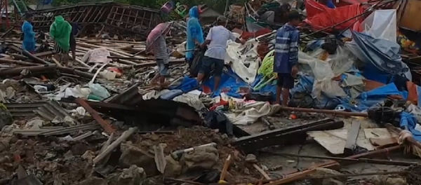 Devastación total en Indonesia tras el paso de un brutal tsunami - Sputnik Mundo